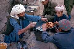 There are always men making and selling things to eat on the streets and there is nothing better than these freshly made biscuits.