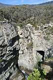 View into Devils Kitchen, steep cliffs of Tasman Peninsula, in Tasman National Park.