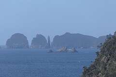 Telephoto view to The Lanterns with the Candlestick and Totem Pole Peninsula off Cape Hauy, from the Waterfall Bay Track, Tasman National Park.