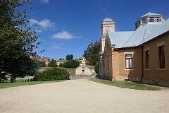 The Asylum or Paupers’ Depot, where by the early 1860s many convicts were housed and treated, according to new ideas that recognised the importance of mental healthcare. The Asylum today includes a museum and café. In the background the Hospital ruins.