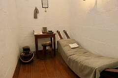A cell in the Separate Prison; the Asylum Convicts were locked in single cells for 23 hours each day. Here they ate, slept and worked, with just one hour a day allowed for exercise, alone, in a high-walled yard.