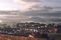 Dawn over Deloraine, an inland town, started in 1831 in the north of Tasmania. In the background Quamby Bluff; in 1988.