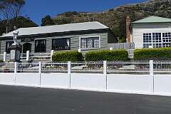 Stanley Wine Bar and the ANZAC monument on Alexander Terrace in Stanley.