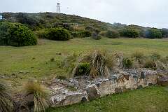 Cape Bruny Lighthouse, on the south-western edge of the cape on South Bruny Island, the second oldest extant lighthouse tower in Australia. It was built by convict labour, 1836-1838 and decommissioned in 1996. In the foreground the ruins of the light-keeper's house.