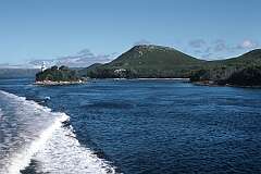 Entrance Island Lighthouse from the Outer Bay at Macquarie Heads at the mouth of the Gordon River.