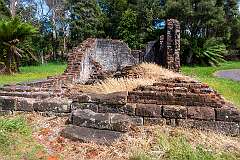 Ruins of Macquarie Harbour Penal Station, a former British colonial penal settlement on Sarah Island that operated between 1822 and 1833.