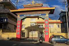 The gate of the Kameng Club in Bomdila, with its Buddhist symbols.