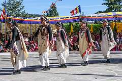 Students perform a Tibetan group dance, depicting agriculture.