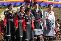 Student dancers posing for a groep photo after their performance at the Upper Gompa of the Gontse Gaden Rabgyel Ling (GRL) Monastery in Bomdila.