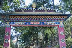 The Welcome/Farewell sign, in  Dirang, from the road to Bomdila, with the Buddhist chakra and deer emblem on top of the gate.