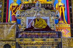 A life-size cutout image of the 14th Dalai Lama on the throne in the main assembly hall of Thupsung Dhargye Ling Monastery; His Holiness consecrated the complex in 2017.
