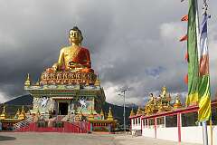 The 9-metre tall gilded bronze statue of Sakyamuni Buddha overlooking Tawang; it was consecrated in 2015 by Thegtse Rinpoche, a prominent figure in Tibetan Buddhism, and the head of Thegtse Khinmey Monastery.