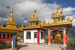 Prayer wheels, statues of the Buddha and bodhisattva, at the complex with the huge Buddha statue, Tawang.