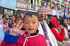 A boy posing at the Carnival Parade on the first day of the Tawang Festival.
