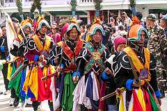 The Carnival Parade, with many colourful dancers, on the last day of the Tawang Festival.