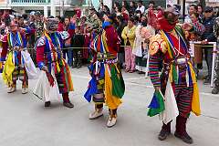 Masked temple dancers, in the Carnival Parade on the last day of the Tawang Festival.