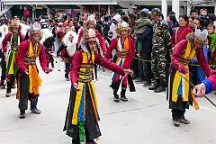 The Carnival Parade, with many colourful dancers, on the last day of the Tawang Festival.