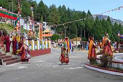 Participants in the spiritual dance return to the main hall of the Monastery.