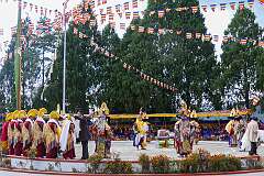 Monks with ceremonial headdresses presented with “khata” ceremonial scarves, to the dancers at the Drub-chod-Chen-Mo Cum Bomdila Torgya.