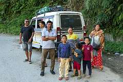Passengers of the Tata Sumo, public transport on the road to Itanagar.