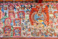 Wall painting at Khinmey Nyingma Monastery, founded in 1440. The main prayer hall is covered with fantastic, brightly coloured murals of hundreds of deities.