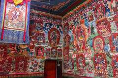 Wall painting at Khinmey Nyingma Monastery, founded in 1440. The main prayer hall is covered with fantastic, brightly coloured murals of hundreds of deities.