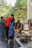 A Hindu priest with devotees at the Shiv Linga, at Shree Sidheshwar Nath Temple.