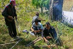 Making a fire to cook eggs in bamboo containers, during a Donyi Polo ritual near Tajang Village.