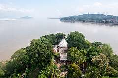 The Sri Umananda Temple on Peacock Island in the Brahmaputra River from the Guwahati Passenger Ropeway with North Guwahati.