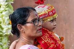 A mother and her son on the grounds of the Maa Kamakhya Devalaya.
