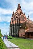 Siva Dol, the temple of Shiva, built in 1734 by Bar Raja Ambika, queen of Ahom king Swargadeo Siva Singha (1714–1744). It is the tallest (40 metres) among the three temples built along the south shore of Sibsagar Pukhuri.