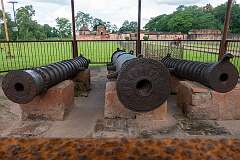 Bronze cannons at the entrance of Talatal Ghar, the royal palace of the Ahom Kings.