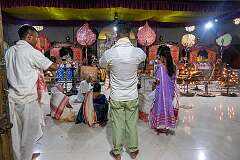 Devotees in the Sri Sri Auniati Satra, a hub for the Brahma Sanghati of the Ekasarana Dharma, preserving and promoting Assamese spiritual and cultural heritage.
