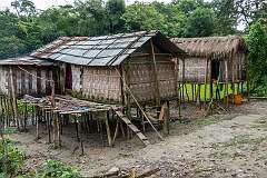 Houses of Mishing people at Monika Pathar; the Mishing (or Miri) are a Sino-Tibetan ethnic group primarily living in the riverside areas of Assam and Arunachal Pradesh.