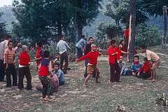 A young Buddhist novice monk practicing debating at the Tsuglagkhang, the Dalai Lama’s temple.