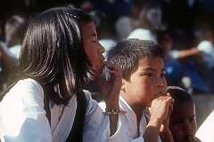 Students listening to the speech of the Dalai Lama.