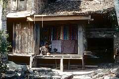 A tailor in his shop on a canal in Srinagar.