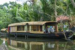 A house boat on the backwaters near Breeze Backwater Homes, in Kodamthuruth.