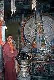 Nowang Dorjey, a monk at an image of a 1000-arm Avalokiteshvara in the monastery in Leh Palace.