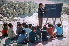 An arithmetic lesson outside, in Lamdon Model School.