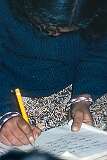 A girl writing in Hindi, in Lamdon Model School.