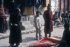 Selling carpets on the street in the bazaar of Leh.