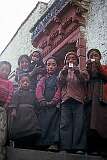 Children on the steps of a house in Leh.