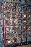 Niches with old manuscripts folios in the library of Thikse Monastery