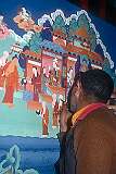 A monk painting a mural in Thikse Gompa.