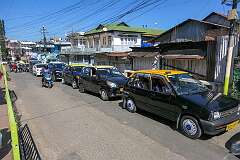 Taxis along Mawkhar Main Road in Shillong.