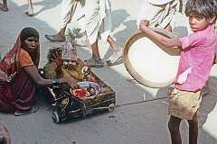 Begging with a crippled child at the festival in Pushkar.