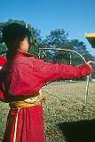 A boy practicing archery on the grounds of the Tsuklakhang Palace, Royal Chapel and Monastery.
