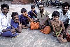 Men and boy Devotees, their faces painted with sacred “tika”, pilgrims at the Brihadisvara Temple.