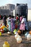 At a communal water tank in their village on the southern shore in Chennai.